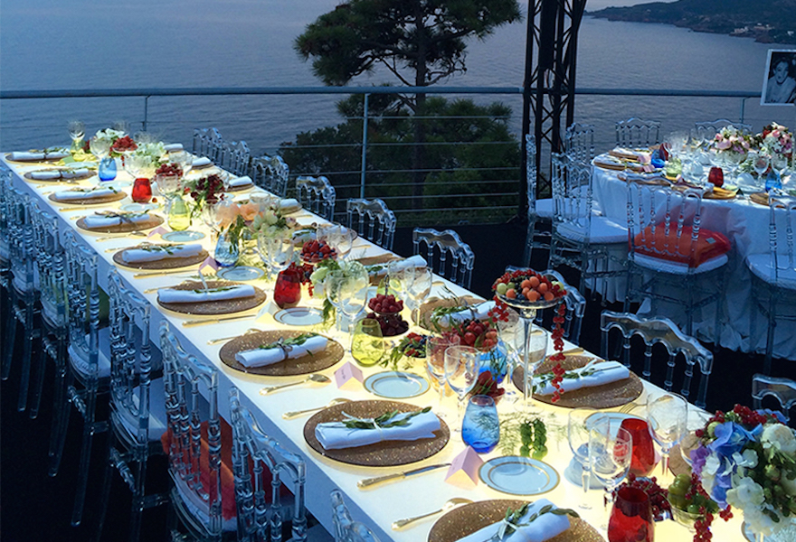 Table laid out for an outdoor dinner party at the Palais Bulles